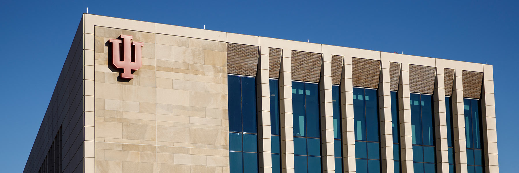The Health Sciences building against a blue sky